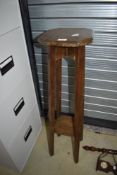 A vintage plant stand