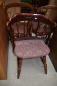 A set of three stained frame pub style dining chairs