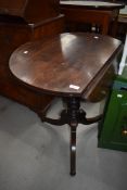 A Victorian mahogany occasional drop leaf table, having turned pedestal and triple splay legs, width