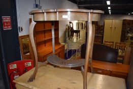 A late 19th or early 20th Century mahogany side table having carved top , plain undertier, on shaped