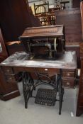 A 19th Century American treadle sewing machine, labelled New Home Sewing Machine Company, Orange