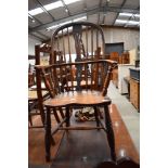 A 19th Century ash windsor style chair having H stretcher