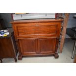 An impressive early Victorian mahogany secretaire desk having well fitted interior and double