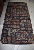 A vintage carpet piece, rug size with rounded edges, approx. 186 x 92cm