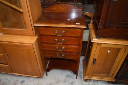 A reproduction regency sheet music cabinet with drop fronted drawers