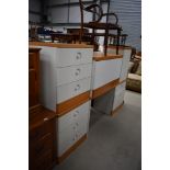 A selection of modern golden oak and white laminate bedroom furniture
