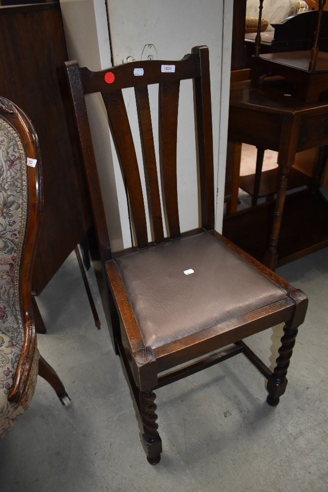 An oak framed dining chair