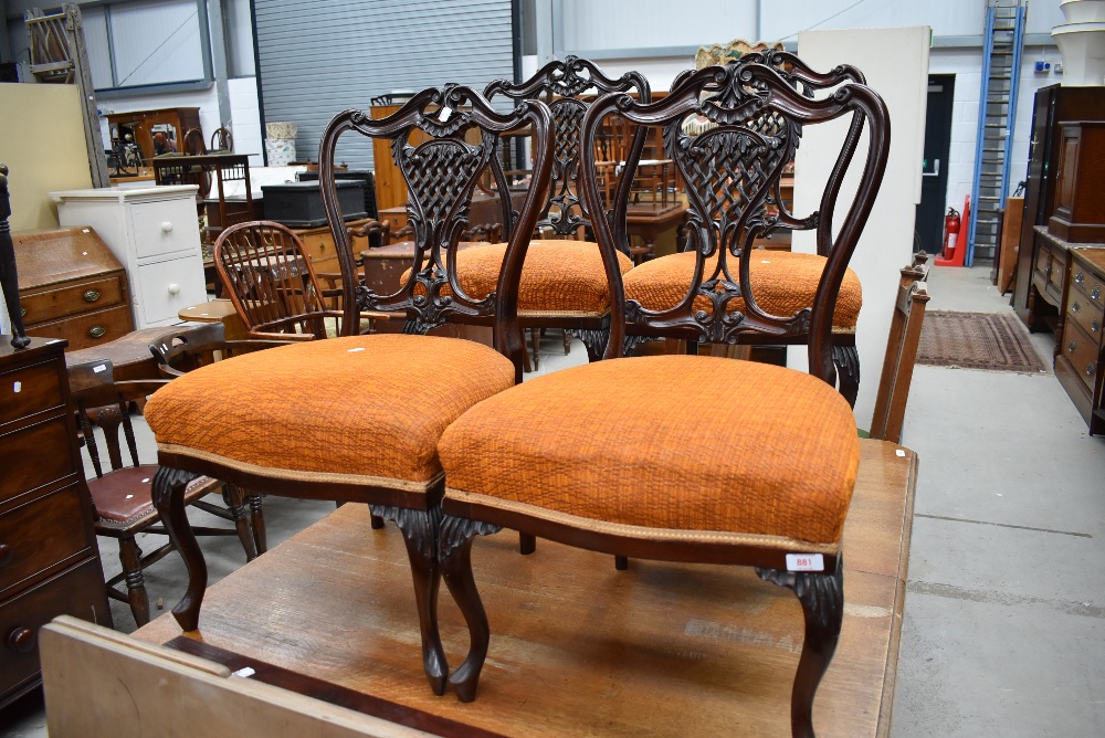 A set of four 19th Century mahogany salon chairs, two having lower seats