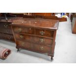 An Edwardian chest of three drawers having original handles and oak lining
