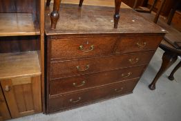 A set of oak drawers being two over three with cock beaded frontage and original handles