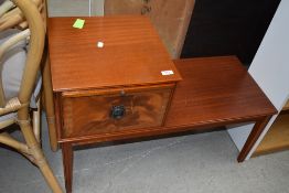 A mid century telephone table