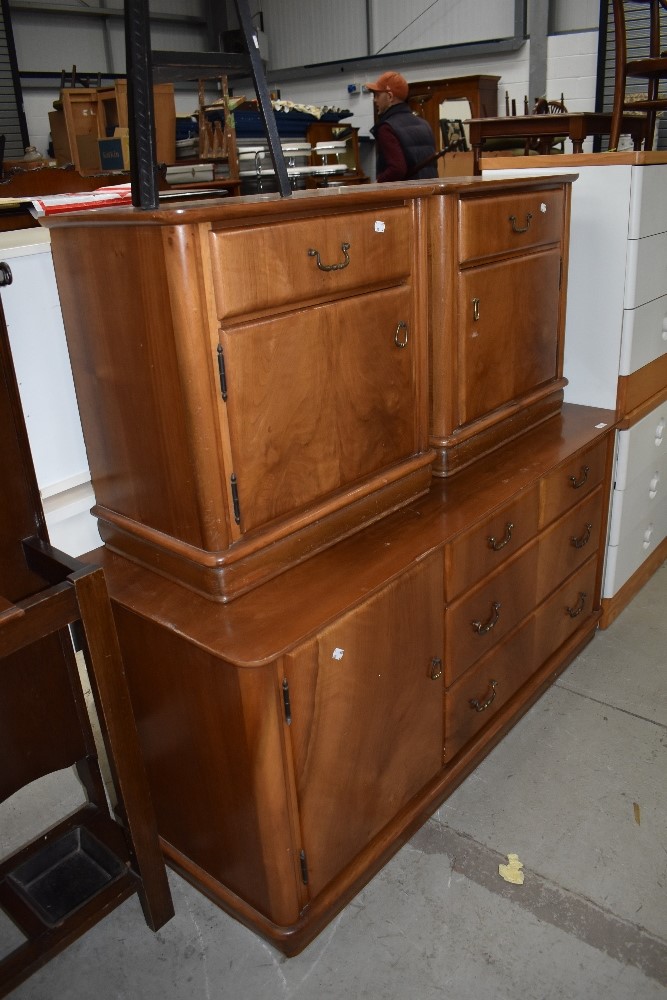 A selection of mid century bedroom furniture including double side cabinets and drawer base in a