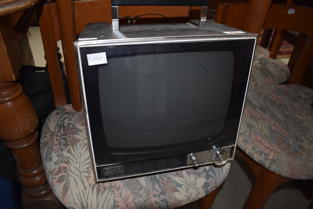 A vintage Sony Solid State portable TV , model TV-110UK, 240 and 12v (sold as collectors item only)