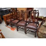 A set of six plus two carver mid Victorian dining chairs having ball and claw feet with fretted