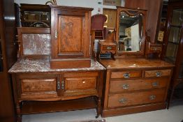 A Victorian oak four piece bedroom suite comprising triple wardrobe with central mirror panel,