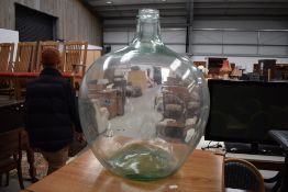 A glass carboy, height approx. 60cm