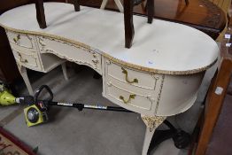 A vintage French style kidney shaped dressing table
