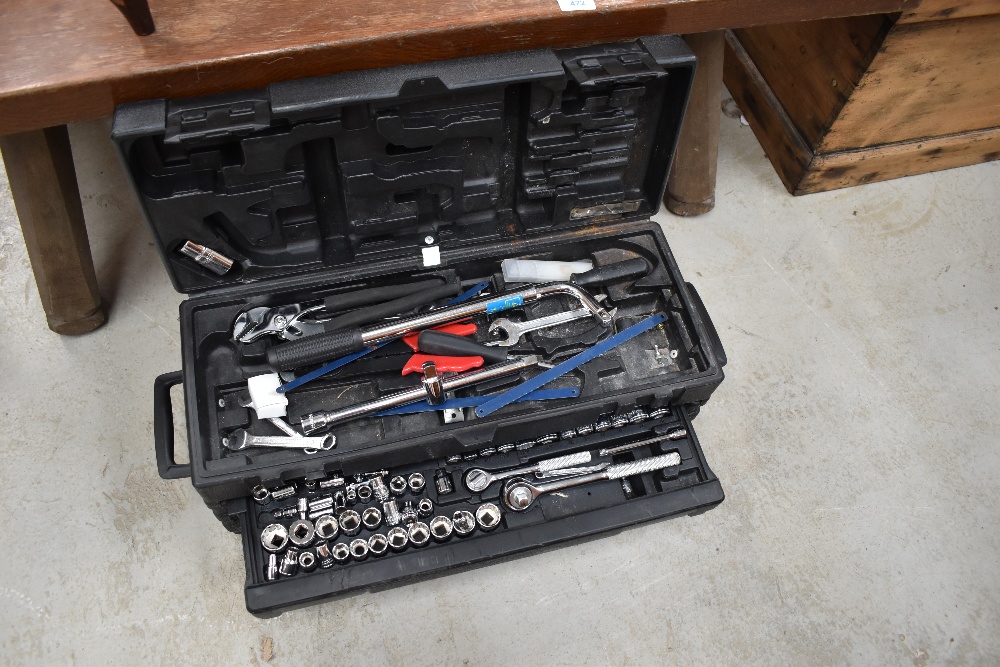 A toughened plastic tool box and contents including socket set