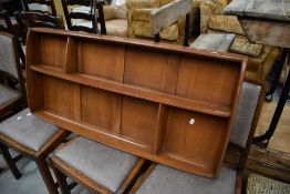 An Ercol wall shelf