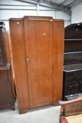 An early to mid 20th Century oak and ply wardrobe, width approx. 93cm