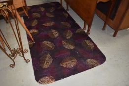 A mid century design carpet rug or runner in a retro design