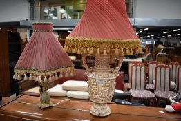 Two classical reproduction lamps one chalk ware and similar brass and onyx style