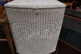 A Lloyd Loom linen basket