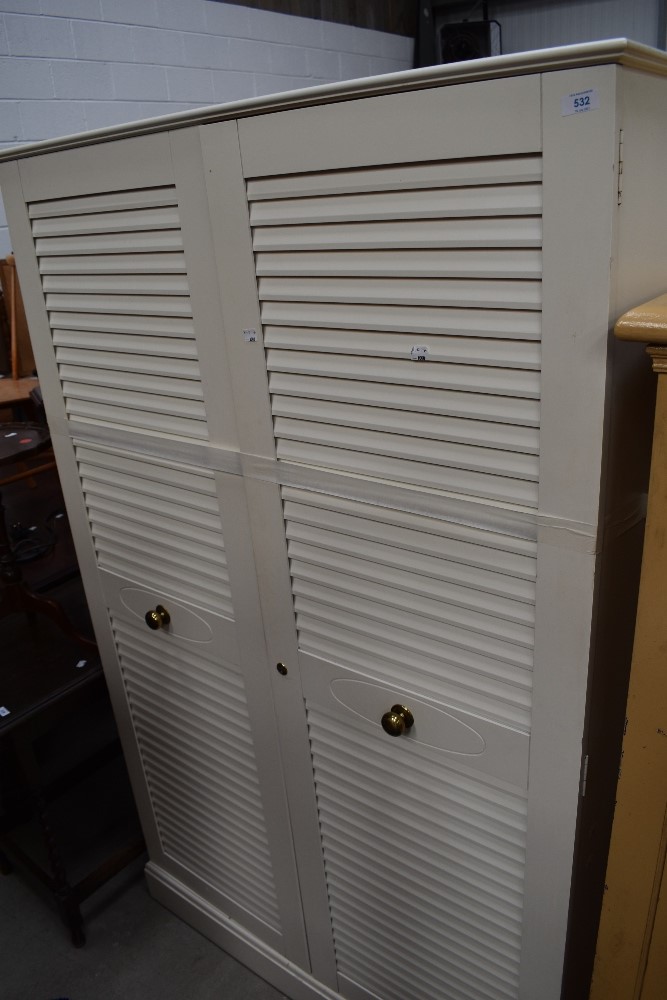 A modern laminated slatted door double wardrobe