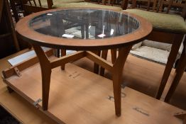 A mid century atomic styled circular side or wine table