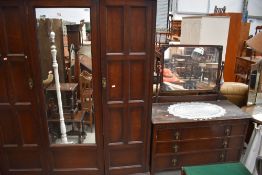 An early 20th Century Waring and Gillow wardrobe and dressing table