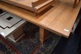 A large American oak extending dining table, possibly Ethan Allen, distressed finish
