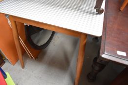 A mid century beech wood frame kitchen utility table with laminated top by Kandya in good condition