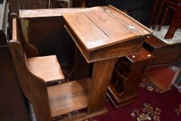 A Victorian pitch pine school masters or factory style clerks seat and desk