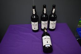 Four bottles of 1982 Sandemans Vintage Port, bottled in 1984, 75cl, no abv, two bottles with