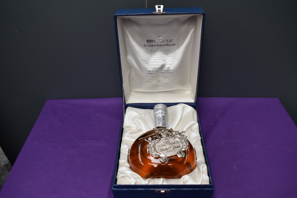A bottle of Whyte & Mackay Deluxe 12 Year Old Blended Scotch Whisky, Royal Wedding Charles & Diana