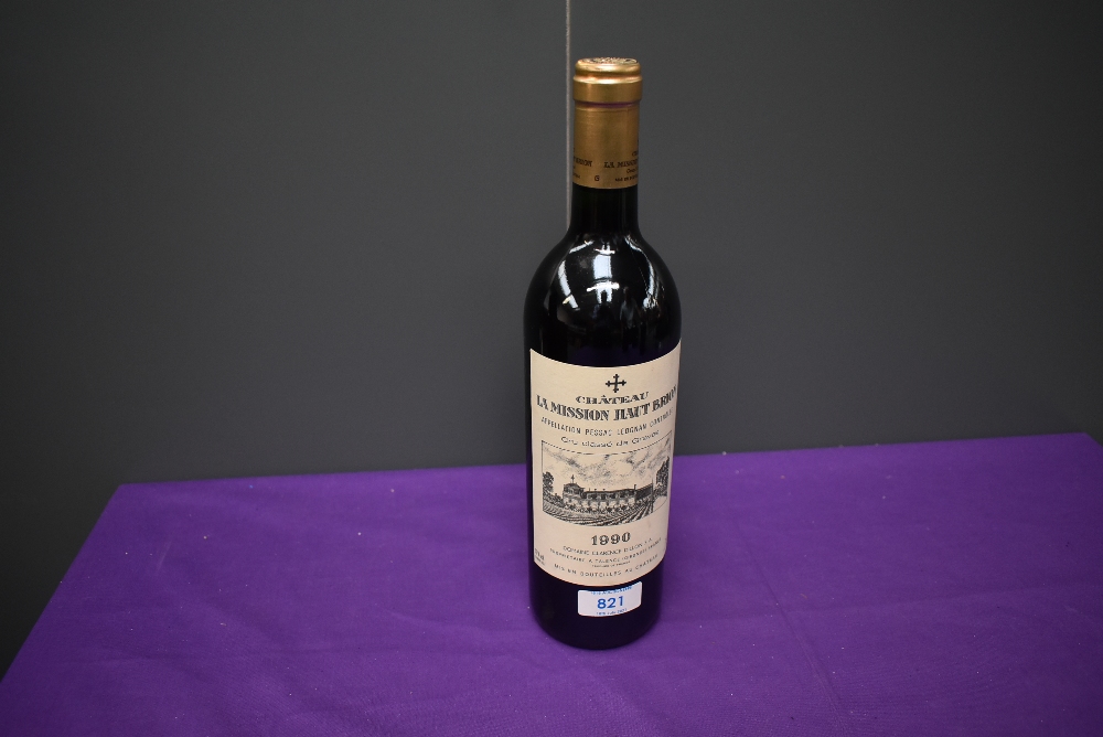 A bottle of 1990 Chateau La Mission Haut Brion Cru Classe De Graves, Domaine Clarence Dillon S.A,