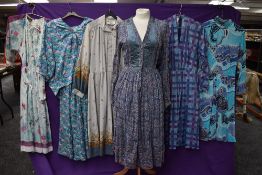 A collection of vintage and retro Ladies clothing in a mixture of colours,styles and eras