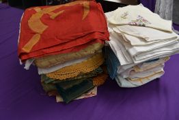 A lovely lot of vintage and antique table linen, tea cosies, table cloths,mats, flag, table runner