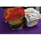 A lovely lot of vintage and antique table linen, tea cosies, table cloths,mats, flag, table runner