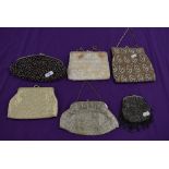 A collection of vintage evening bags beaded and embroidered examples amongst this lot