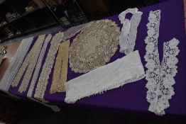 A varied lot of antique lace,tatting,tulle and fine embroidered items,including trims, shawl and