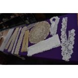 A varied lot of antique lace,tatting,tulle and fine embroidered items,including trims, shawl and