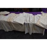 A good quantity of Victorian nightdresses,shifts, camisoles and aprons,some age staining.