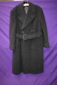 A gents 1950s double breasted overcoat with belt to waist,larger size.