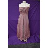 A 1950s strapless evening gown having iridescent blue and pink finish.