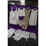 A collection of antique Victorian and Edwardian white wear including bodice,petticoats,camisole,