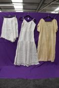 A Chinese 1920s silk nightdress a set of early 20th century knickers with lace detailing and a