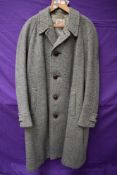 A gents vintage 1950s overcoat by Dunn and Co 'Cloth made by Crombie, Aberdeen, Scotland', single