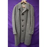A gents vintage 1950s overcoat by Dunn and Co 'Cloth made by Crombie, Aberdeen, Scotland', single