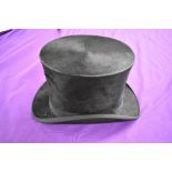 An antique top hat 'R.W.T.K Thompson Kendal' internal measurement approx 21' height approx 5.5',some